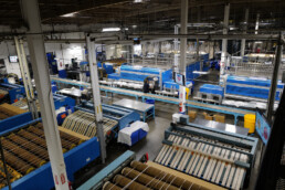 Industrial folder machines inside warehouse